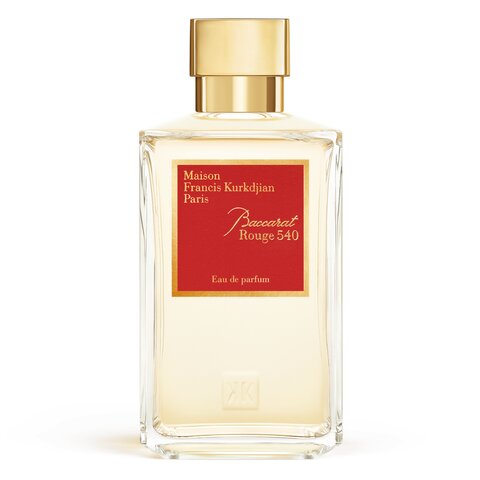 Baccarat Rouge 540 Eau de Parfum bottle — faceted clear glass with a red and gold label and gold cap
